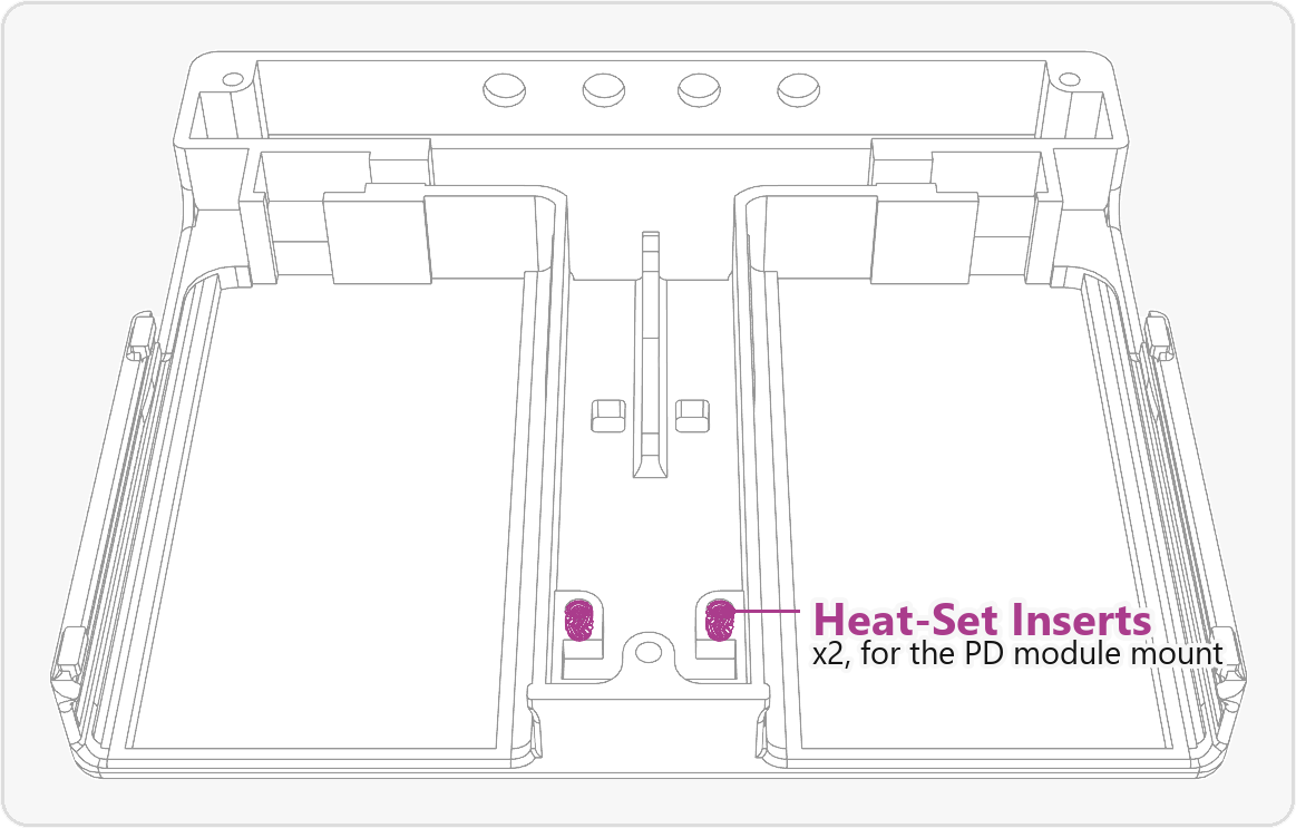 Two heat-set inserts highlighted in the base, where the PD module mount bolts down