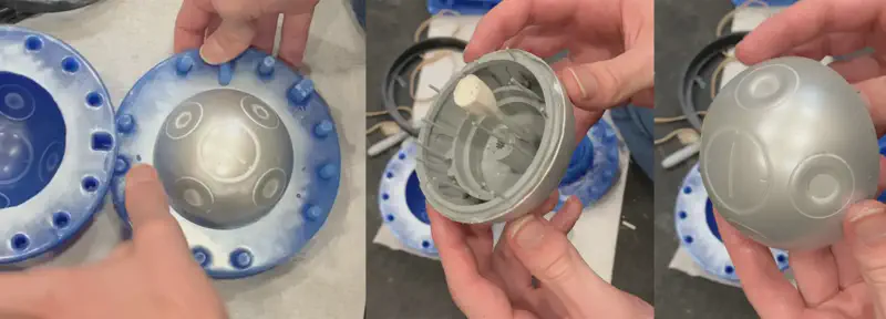 Freshly demolded shell components showing metallic finish from mica powder